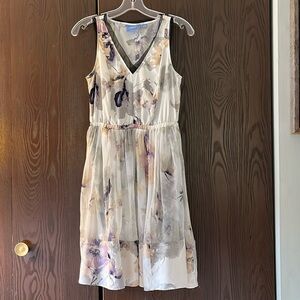 Simply Vera sleeveless, silky appearance dress. Size XS. Sheer skirt.